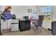 Functional home office with a modern desk, storage, and natural light at 5225 Tuscany Ln, Davenport, FL 33897