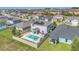 Backyard features a refreshing swimming pool surrounded by fencing, perfect for relaxation and entertaining at 5225 Tuscany Ln, Davenport, FL 33897