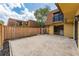 Backyard features a concrete patio surrounded by a wooden fence at 5251 Brook Ct # 242, Orlando, FL 32811