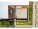 Overhead view of private patio with concrete floor and partial fence enclosure with a small garden at 5251 Brook Ct # 242, Orlando, FL 32811