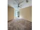 Bright bedroom with a ceiling fan and a sunny window, great for a peaceful rest at 6169 Metrowest Blvd # 208, Orlando, FL 32835