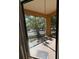 Screened lanai overlooking green landscape at 6169 Metrowest Blvd # 208, Orlando, FL 32835