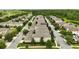 Beautiful community with well-maintained streets, sidewalks, and landscaped yards with mature trees at 6834 Habitat Dr, Harmony, FL 34773