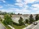 An eye-level view of a two-story home with manicured landscaping at 6834 Habitat Dr, Harmony, FL 34773