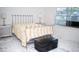 Bedroom with marble floor and a stylish metal frame bed at 7410 Orange Crest Cir, Lakeland, FL 33810