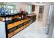 Functional kitchen featuring a sleek countertop, wooden drawers, and modern appliances at 7410 Orange Crest Cir, Lakeland, FL 33810