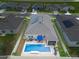 Overhead shot of backyard featuring a refreshing pool, patio furniture, and fenced-in yard for privacy at 757 Citrus Reserve Blvd, Davenport, FL 33837