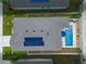 Overhead view showcasing home's roof with solar panels, an inviting pool, and well-maintained fenced backyard at 757 Citrus Reserve Blvd, Davenport, FL 33837