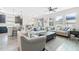 Open floorplan with living room, dining area, kitchen and tile flooring throughout at 757 Citrus Reserve Blvd, Davenport, FL 33837
