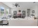 Comfortable living room with neutral tones, ceiling fan, sofas, and media center at 757 Citrus Reserve Blvd, Davenport, FL 33837