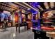 Custom decorated game room features pool table, foosball and Spider-Personal décor at 7622 Oakmoss Loop, Davenport, FL 33837