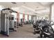Community gym with weightlifting and cardio machines at 7622 Oakmoss Loop, Davenport, FL 33837