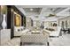 Clubhouse lounge with ample seating, modern lighting, and decorative accents at 7622 Oakmoss Loop, Davenport, FL 33837