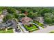 Desirable home with well-kept lawn, lush landscaping, circular driveway, and backyard pool at 7846 Snowberry Cir, Orlando, FL 32819
