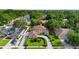 Stunning two-story home with manicured landscaping and a circular driveway in a lush neighborhood at 7846 Snowberry Cir, Orlando, FL 32819