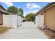 The fenced backyard features a patio area ideal for outdoor entertaining at 7846 Snowberry Cir, Orlando, FL 32819