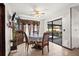 Dining room features a ceiling fan, tile flooring, and a sliding glass door at 7846 Snowberry Cir, Orlando, FL 32819