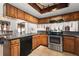 Kitchen with granite countertops, stainless steel appliances, and tile flooring at 7846 Snowberry Cir, Orlando, FL 32819