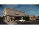 A new commercial construction exterior with storefronts, parking lot, covered sidewalk, and outdoor dining at 7900 S Orange Blossom Trl # 2102, Orlando, FL 32809