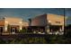 A new commercial construction exterior with storefronts, parking lot, covered sidewalk, and outdoor dining at 7900 S Orange Blossom Trl # 2102, Orlando, FL 32809