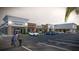 New commercial construction exterior with storefronts and parking lot rendering on a sunny day at 7900 S Orange Blossom Trl # 2102, Orlando, FL 32809