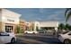 A new commercial construction exterior with storefronts and parking lot rendering at 7900 S Orange Blossom Trl # 2102, Orlando, FL 32809