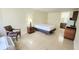 A compact living space featuring tile floors and natural light at 7900 S Orange Blossom Trl # 2102, Orlando, FL 32809