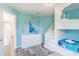 Charming bedroom featuring a unique bunk bed, light blue walls, and a view to the hallway at 8491 Oasis Key Cv, Kissimmee, FL 34747