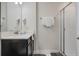 Clean bathroom featuring a vanity with ample counter space and walk-in shower at 8947 Stinger Dr, Davenport, FL 33896