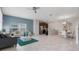 Open-concept living area flows into the kitchen and dining spaces at 8947 Stinger Dr, Davenport, FL 33896