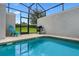 Private pool with lounge chair and grill at 8947 Stinger Dr, Davenport, FL 33896