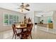 Cozy dining area featuring tile floors and a view into the living room at 1016 Ohanlon Ct, Oviedo, FL 32765
