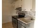Updated kitchen area featuring stainless steel appliances and granite countertops at 1203 Atlantic Ct, Kissimmee, FL 34759