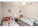 Comfortable bedroom with Mickey Mouse themed bedding and decor on twin beds at 1659 Sage Creek Ct, Orlando, FL 32824