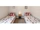 Charming bedroom with twin beds dressed in playful Mickey Mouse bedding and decor at 1659 Sage Creek Ct, Orlando, FL 32824