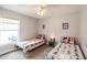 Inviting bedroom with twin beds adorned in Mickey Mouse themed bedding and decor at 1659 Sage Creek Ct, Orlando, FL 32824