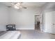 View from the bedroom into the living room and dining area. Neutral colors at 1659 Sage Creek Ct, Orlando, FL 32824