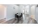 Cozy dining area showcasing modern design, wood floors, and ample space at 1659 Sage Creek Ct, Orlando, FL 32824