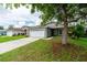 Beautiful single-Gathering home featuring a well-manicured lawn and a spacious two-car garage at 1659 Sage Creek Ct, Orlando, FL 32824