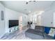 Bright living area showcasing modern decor, wood floors, and ample space at 1659 Sage Creek Ct, Orlando, FL 32824
