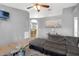 Cozy living room with a large sectional sofa, providing a comfortable gathering space at 166 Paradise Island Dr, Haines City, FL 33844