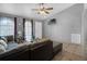 Comfortable living room showcasing tile floors, natural light and modern décor at 166 Paradise Island Dr, Haines City, FL 33844
