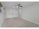 Spacious carpeted bedroom with double closets and ample natural light at 1800 Banyan St, Orange City, FL 32763