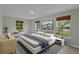 Bright bedroom with a large bed, stylish furnishings, and ample natural light at 1800 Banyan St, Orange City, FL 32763