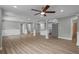 Expansive living area featuring an open layout, contemporary finishes, and lots of natural light at 1800 Banyan St, Orange City, FL 32763