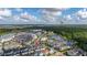 An aerial view of the community and lake in the Walt Disney World Resort area at 1845 Island Village Way, Celebration, FL 34747