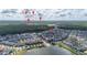 Aerial view showcases the community with nearby shops like Scoops Ice Cream, and Tacos Don Andres at 1845 Island Village Way, Celebration, FL 34747