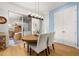 Dining area featuring modern lighting, access to an outdoor patio and classic doors at 1845 Island Village Way, Celebration, FL 34747