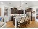 Modern kitchen featuring a central island, stainless steel appliances, and ample cabinet space at 1845 Island Village Way, Celebration, FL 34747