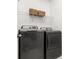 Laundry room featuring washer and dryer and a wire shelf at 1845 Island Village Way, Celebration, FL 34747